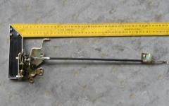 Замок двери левый (механизм с тросом) HOWO WG1642340014/2